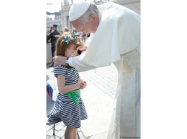 Pope Francis blesses young girl with rare condition
