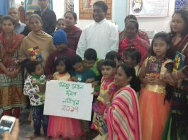 Fr. Robert Gonsalves with Children of Shahebganj